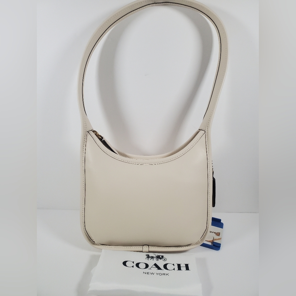 sold Coach Curve Zip Shoulder Bag in Brass/Chalk White Glovetanned Leather NWT